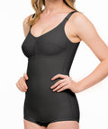Black shapewear garment worn by a model on a white background