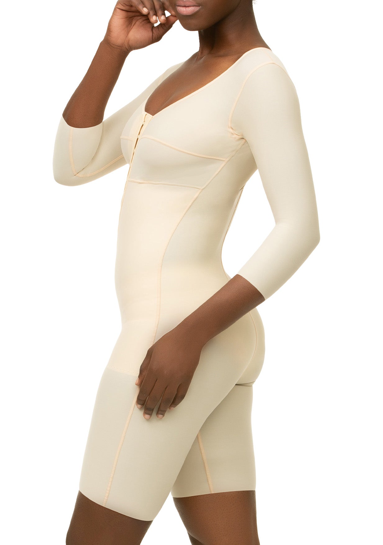 Beige shapewear garment worn by a model on a white background