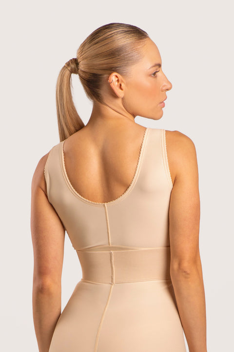 Isavela BR02 Stage 1 surgical bra featuring an integrated 2-inch elastic bust-line for stable breast augmentation and lift recovery, seamless beige medical fabric.