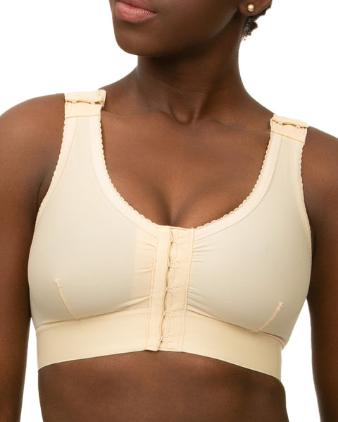 Isavela BR02 Stage 1 surgical bra featuring an integrated 2-inch elastic bust-line for stable breast augmentation and lift recovery, seamless beige medical fabric.