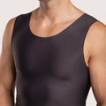 Close-up detail of the black MG04 compression vest, highlighting the breathable medical-grade material and flat-seamed edges for irritation-free wear.