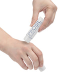 Woman applying Pro-Sil scar treatment on her hand